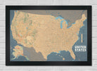 Framed map of the United States on a white brick wall - 2" brushed black frame shown